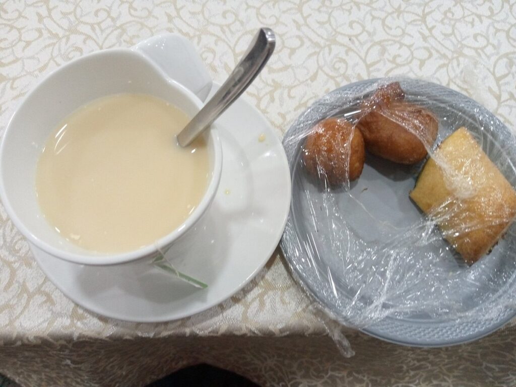 Cup of Green Tea and Snacks
